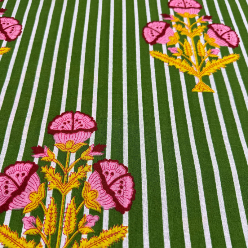 Fabric with pink floral and green striped pattern