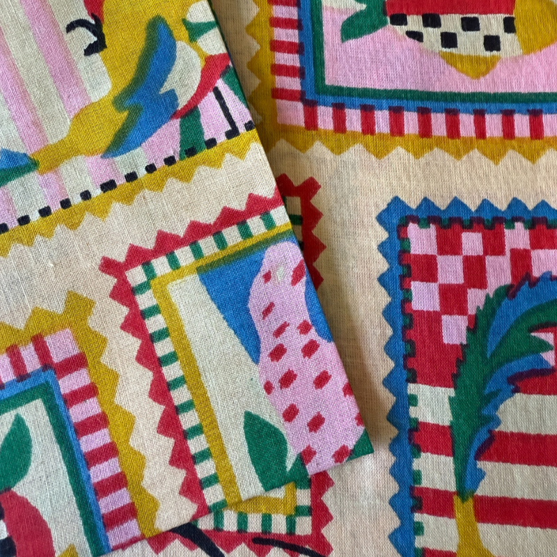 Close-up of a colourful fabric with geometric patterns and vibrant colours