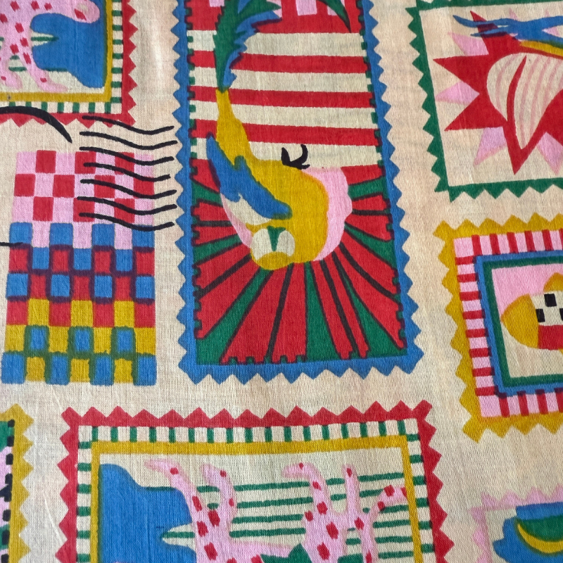 Colorful patchwork fabric with various patterns and shapes