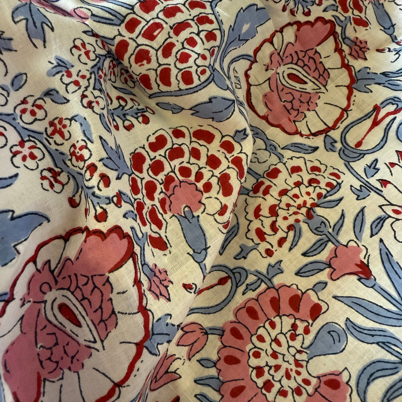 Cotton fabric with red and blue floral pattern