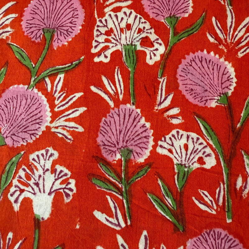 Floral pattern with pink flowers on a red background