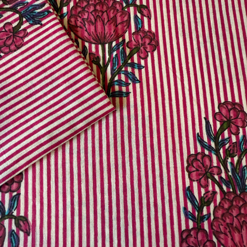 Red and white striped fabric with floral patterns